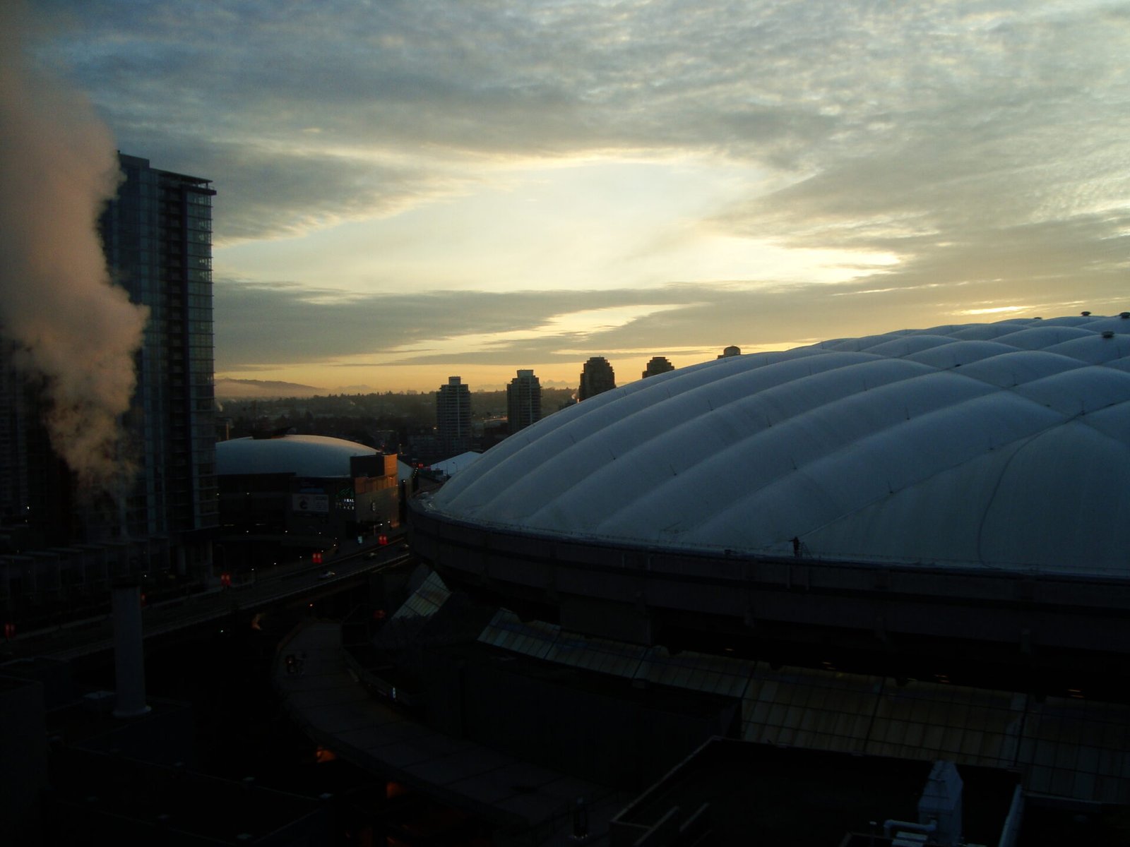Vancouver city skyline at sunrise with BC Place stadium